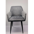 Elegante sillón de terciopelo cosido de diamante